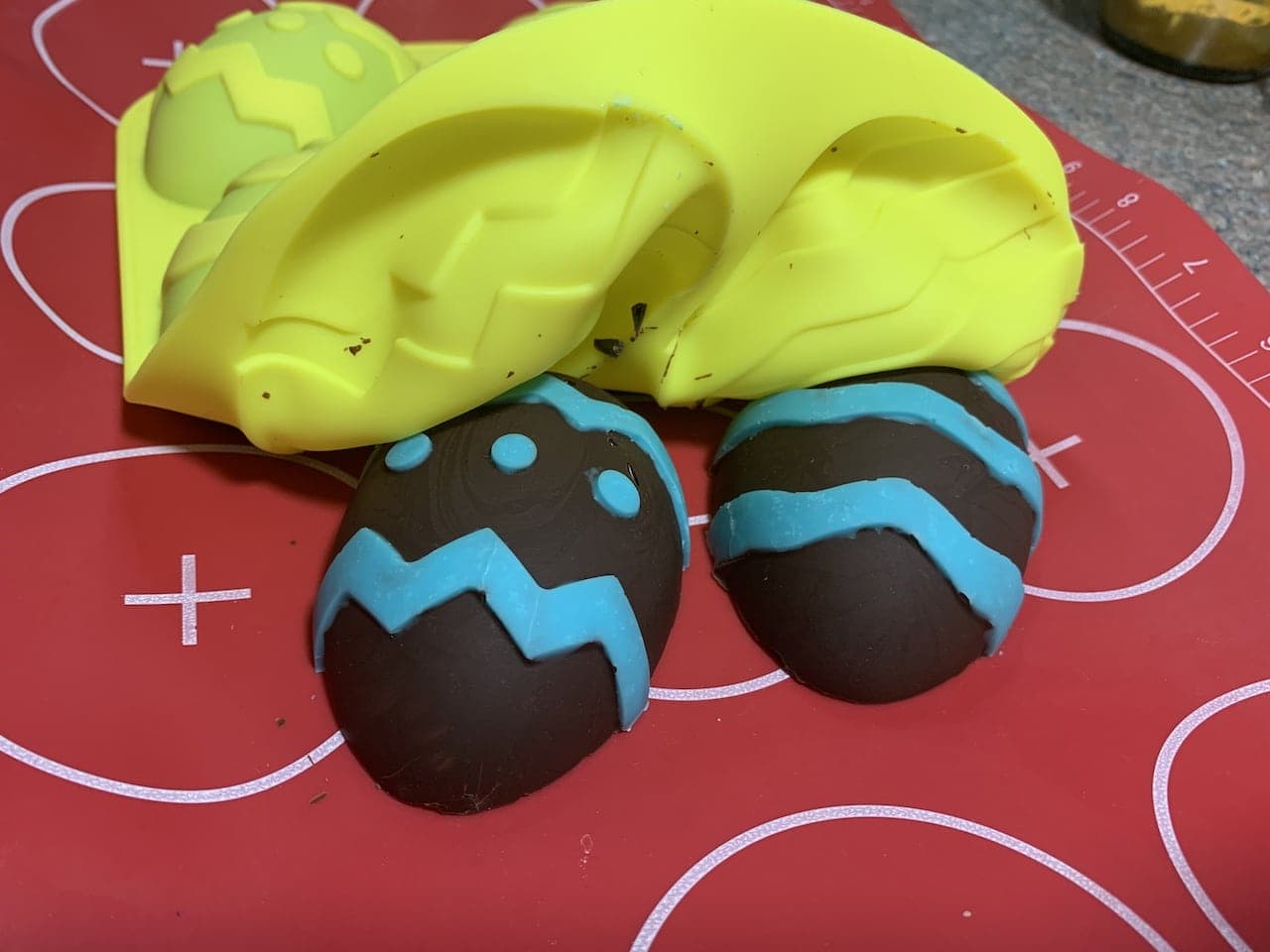 removing the coconut cream eggs from the mold