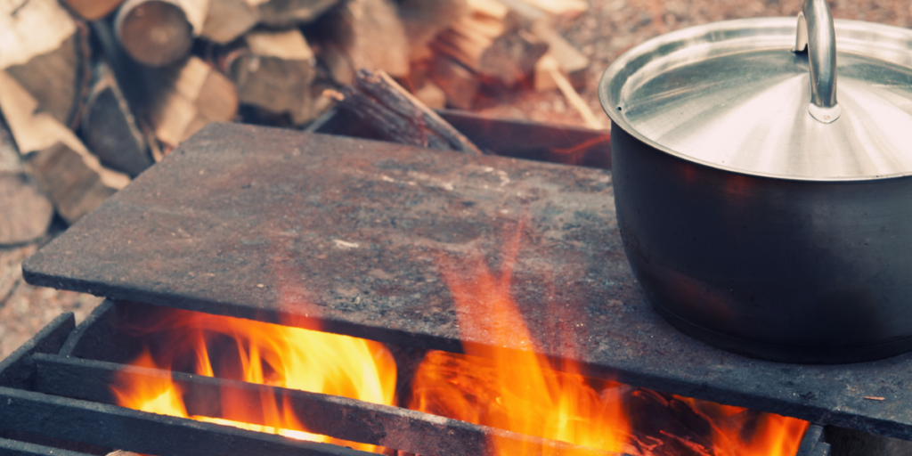 cooking meals over the campfire